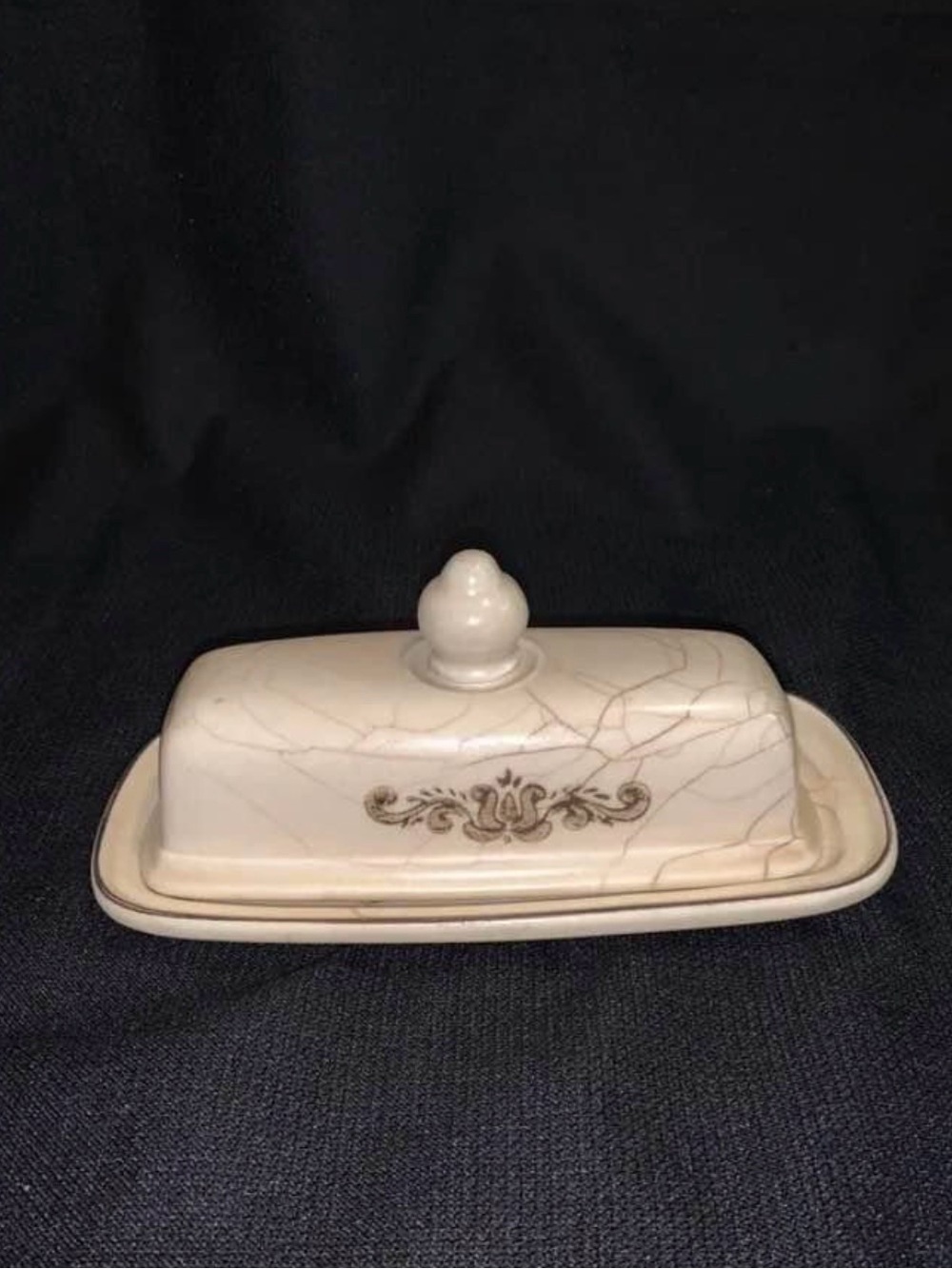 Classic Cream Ceramic Butter Dish with Elegant Gold Scroll Design